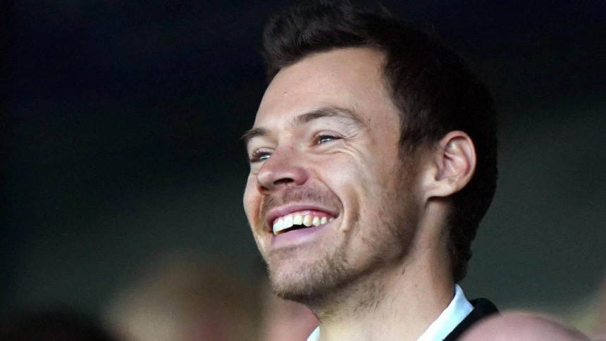 Harry Styles in the stands during the Premier League match at Kenilworth Road, Luton. Picture date: Sunday February 18, 2024.