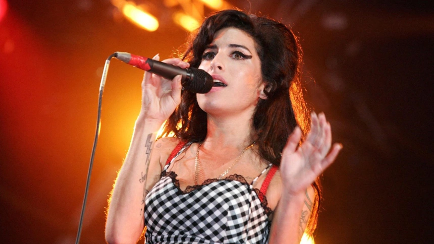 Amy WinehouseThis photograph is for editorial use only and is the copyright of the film company and/or the photographer assigned by the film or production company and can only be reproduced by publications in conjunction with the promotion of the above Film. A Mandatory Credit to the film company is
